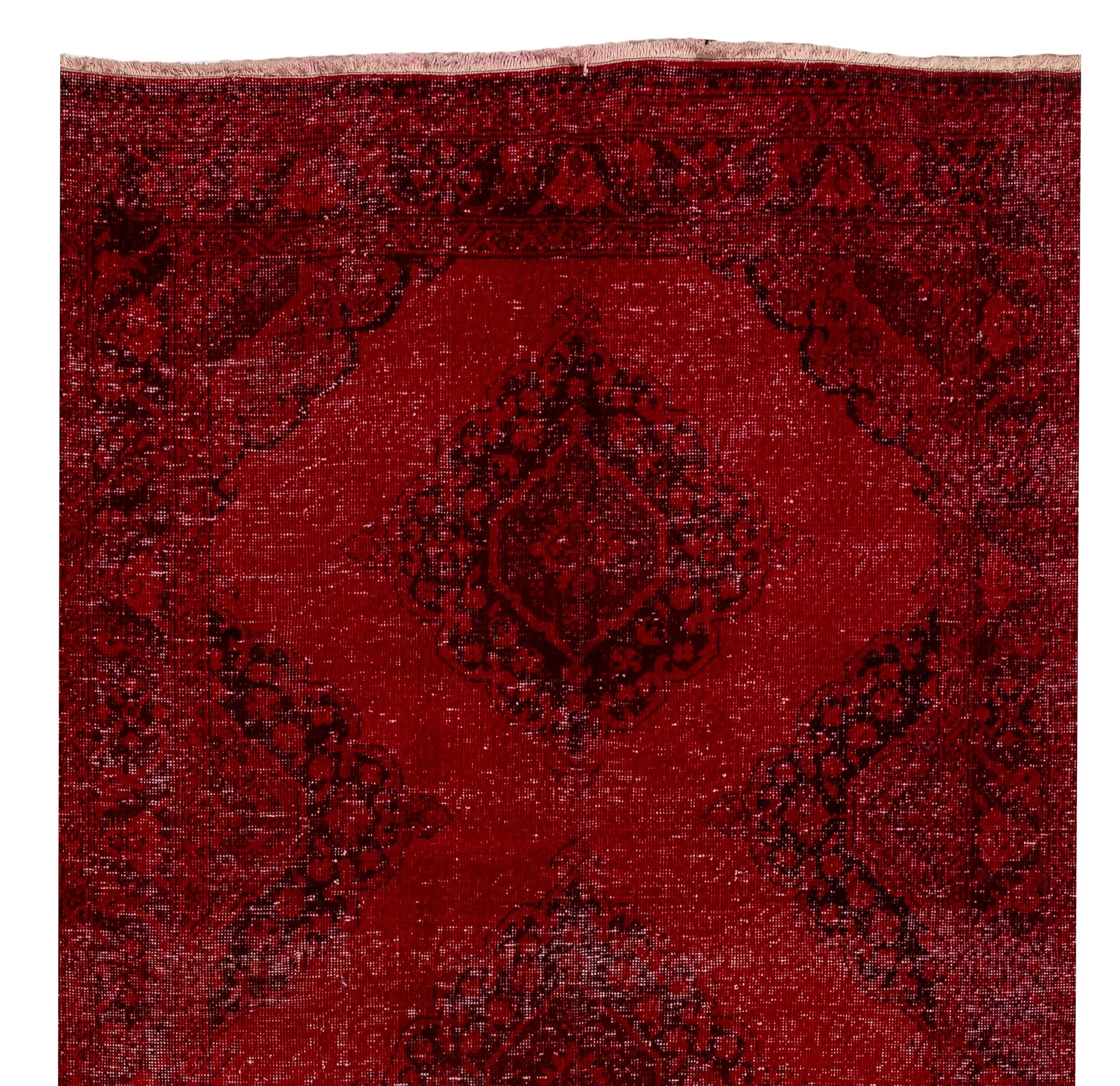 A vintage Turkish runner rug re-dyed in red color, great for contemporary interiors. Measures: 4.3 x 13.5 ft.
Finely hand knotted, low wool pile on cotton foundation. Professionally washed.
Sturdy and can be used on a high traffic area, suitable