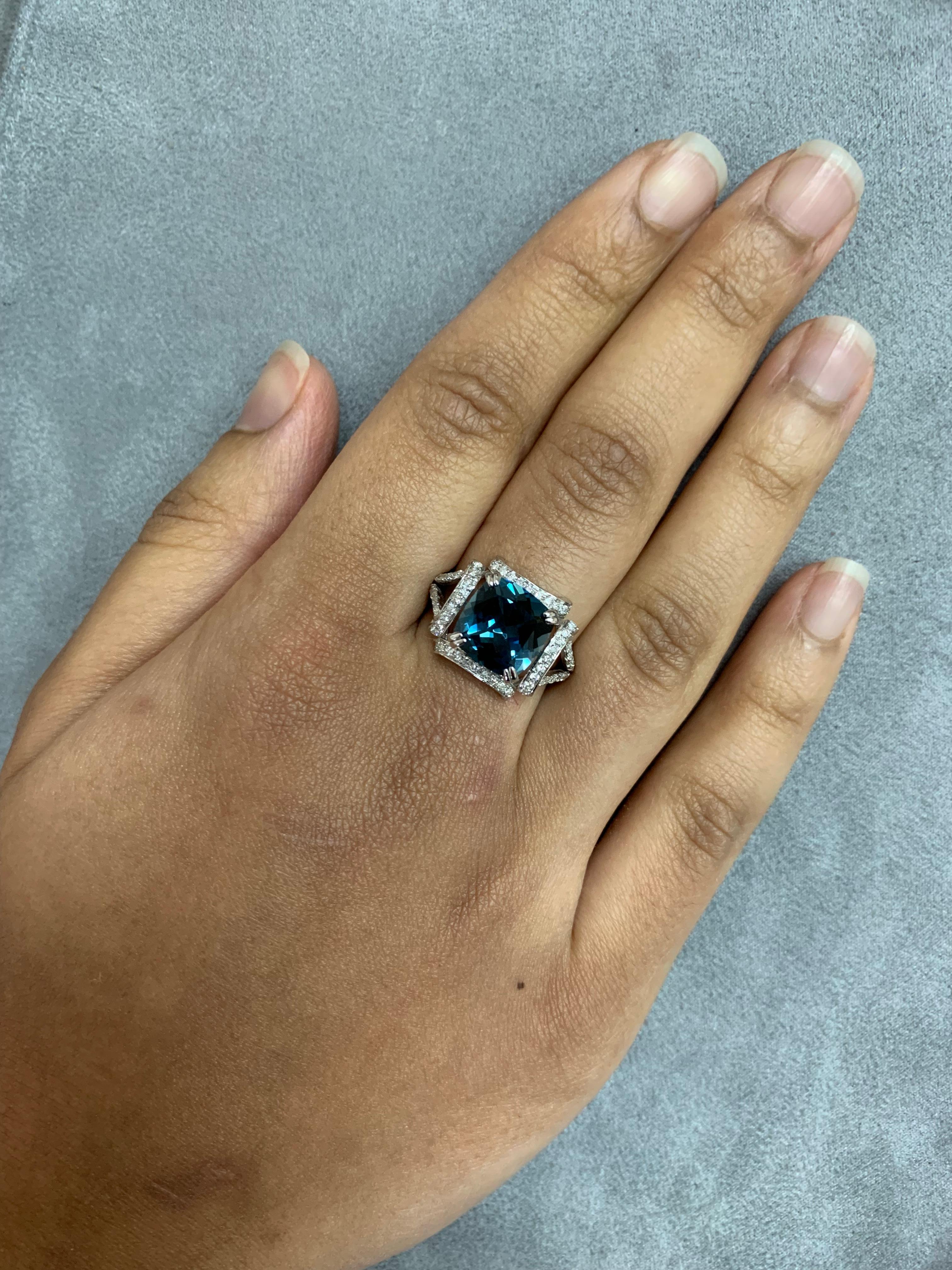 Sunita Nahata presents a collection of bold and colorful cocktail rings. This ring features a royal top london blue topaz stone at the center, with diamonds accenting the 18K white gold.  

London Blue Topaz Ring with Diamond in 18 Karat White