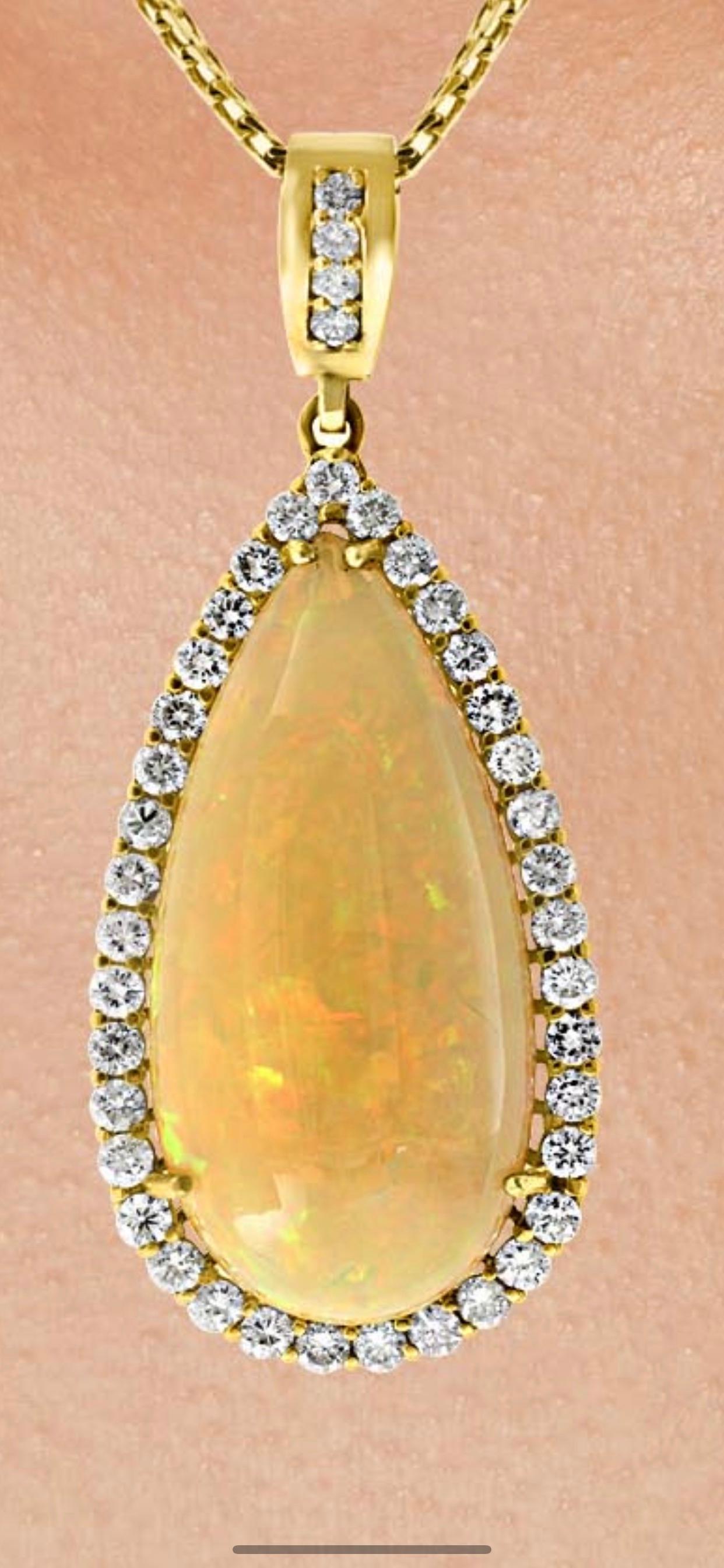 Pear Cut 44 Carat Pear Ethiopian Opal and Diamond Pendant / Necklace 18 Karat Gold Estate
