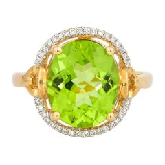 4,3 Karat Peridot und Diamantring aus 18 Karat Gelbgold