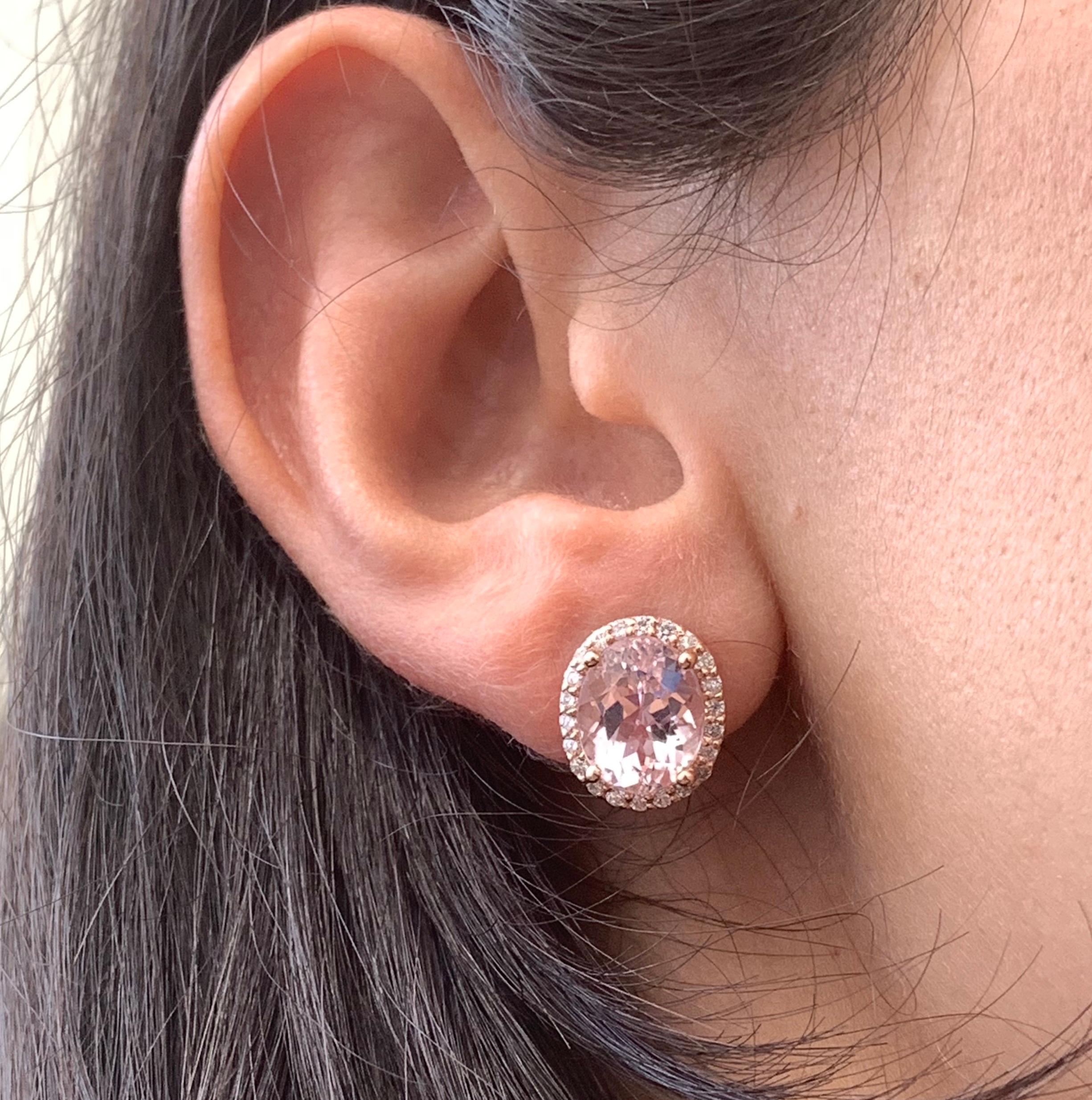 Classic oval pink morganites in a showstopping diamond halo for a fabulous addition to any look!

Material: 14k Rose Gold 
Center Stone Details: 2 Oval Pink Morganites at 4.4 Carats- Measuring 10 x 8 mm
Mounting Diamond Details: 44 Brilliant Round