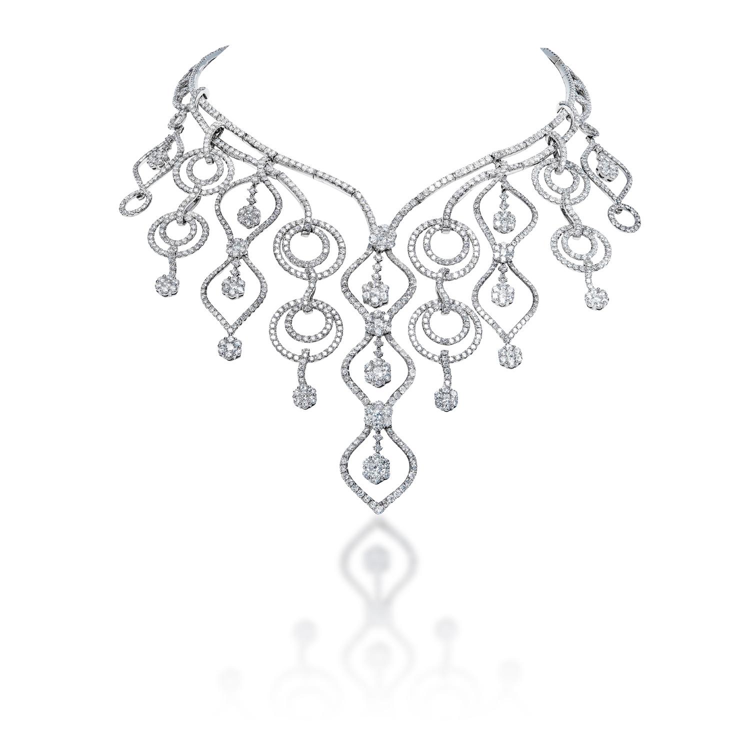 Diamond Necklace:

Carat Weight: 44.30 Carats
Shape: Round Brilliant Cut
Metal: 14 Karat White Gold
Style: Chain Necklace