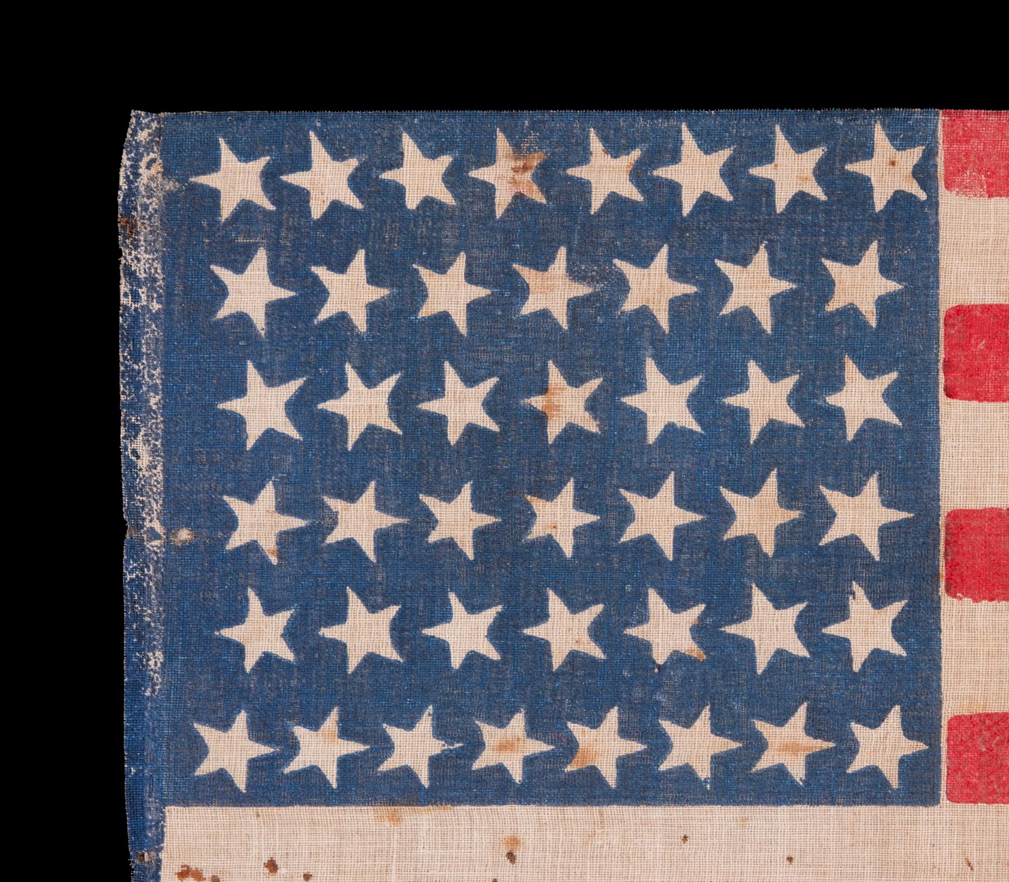 Bandera de desfile antigua de 44 estrellas, formación de reloj de arena, creación del estado de Wyoming ca 1890-1896 Estadounidense en venta