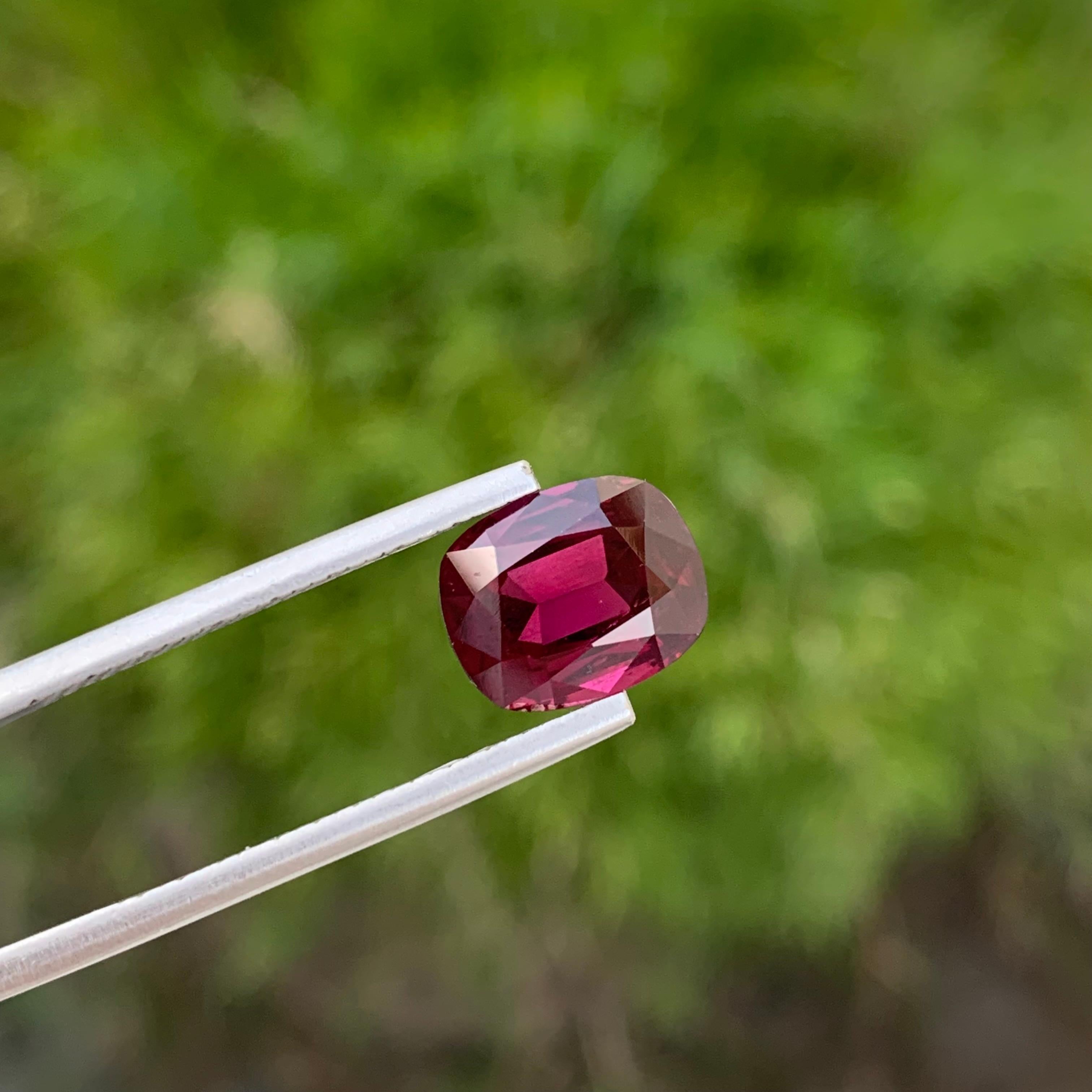 Loose Rhodolite Garnet
Weight: 2.20 Carats
Dimension: 10.1 x 8.2 x 5.6 Mm
Colour: Red
Origin: Africa
Treatment: Non
Shape : Cushion

Rhodolite garnet, a gemstone celebrated for its enchanting reddish-purple hues, occupies a special place in the