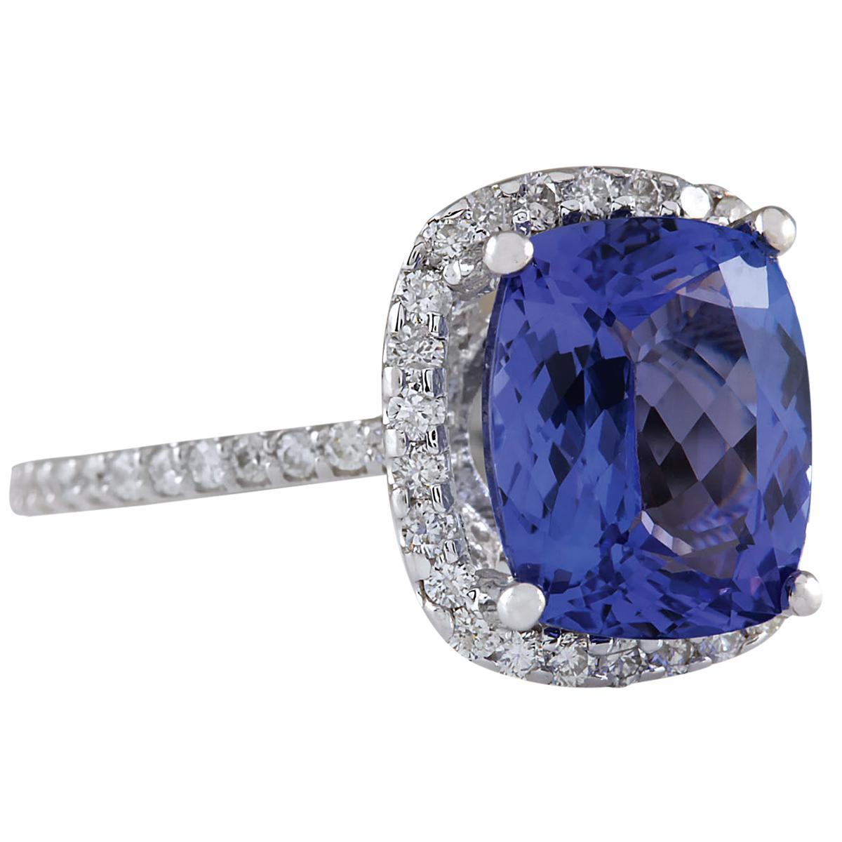 4.40 Carat Natural Tanzanite 14 Karat White Gold Diamond Ring
Stamped: 14K White Gold
Total Ring Weight: 2.6 Grams
Total Natural Tanzanite Weight is 3.70 Carat (Measures: 10.00x8.00 mm)
Color: Blue
Total Natural Diamond Weight is 0.70 Carat
Color: