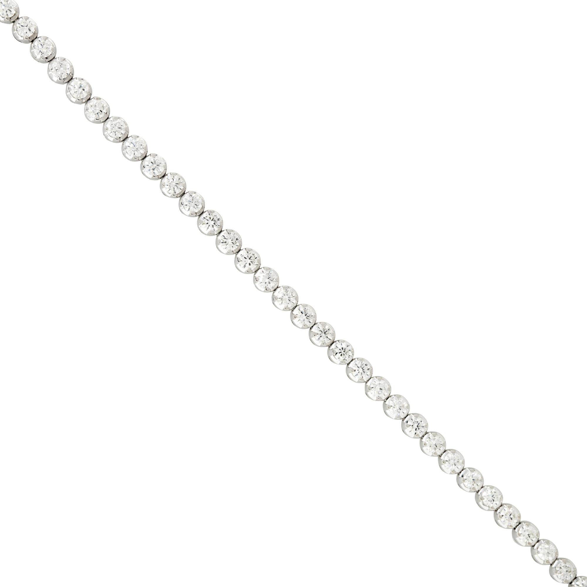 14k White Gold 4.40ctw Round Brilliant Diamond Tennis Bracelet
Material: 14k White Gold
Diamond Details: There are approximately 4.40 carats of Round Brilliant cut Diamonds. Diamonds are approximately H/I in color and approximately SI in clarity.