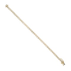 Bracelet tennis en or jaune avec lunette de diamants ronds de 4,40 carats