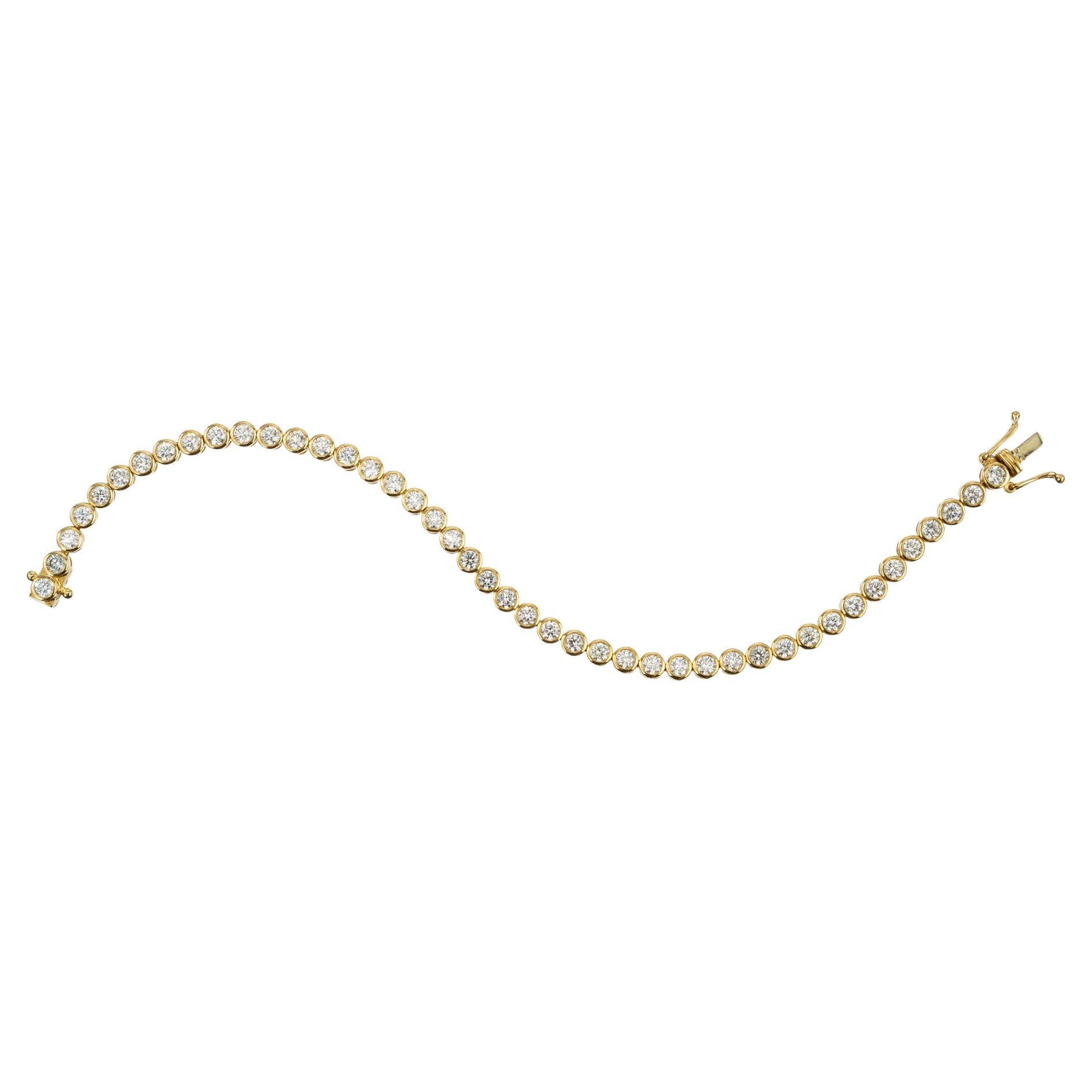 Bracciale tennis in oro giallo con lunetta di diamanti rotondi da 4,40 carati