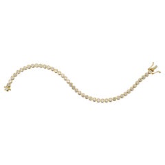 4,40 Karat runde Diamanten Lünette Gelbgold Tennis-Armband