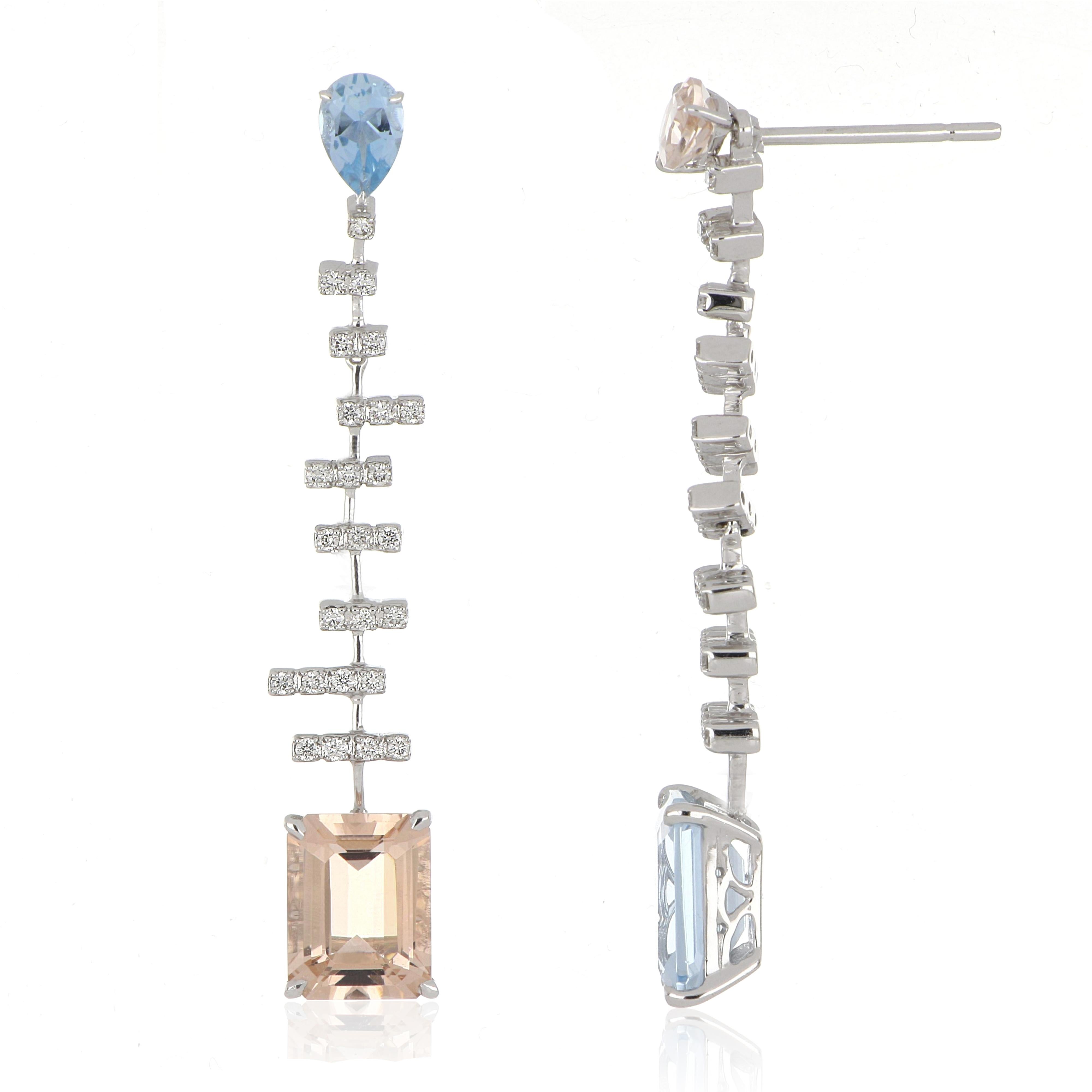 Elegant and Exquisitely detailed Mismatched Dangling Gold Earrings, set with 2.03 Ct (total ) Aquamarine, 2.37 Cts (total)  Morganite, accented with micro pave set Round Diamonds, weighing approx. 0.32 Cts. total carat weight.  Beautifully Hand