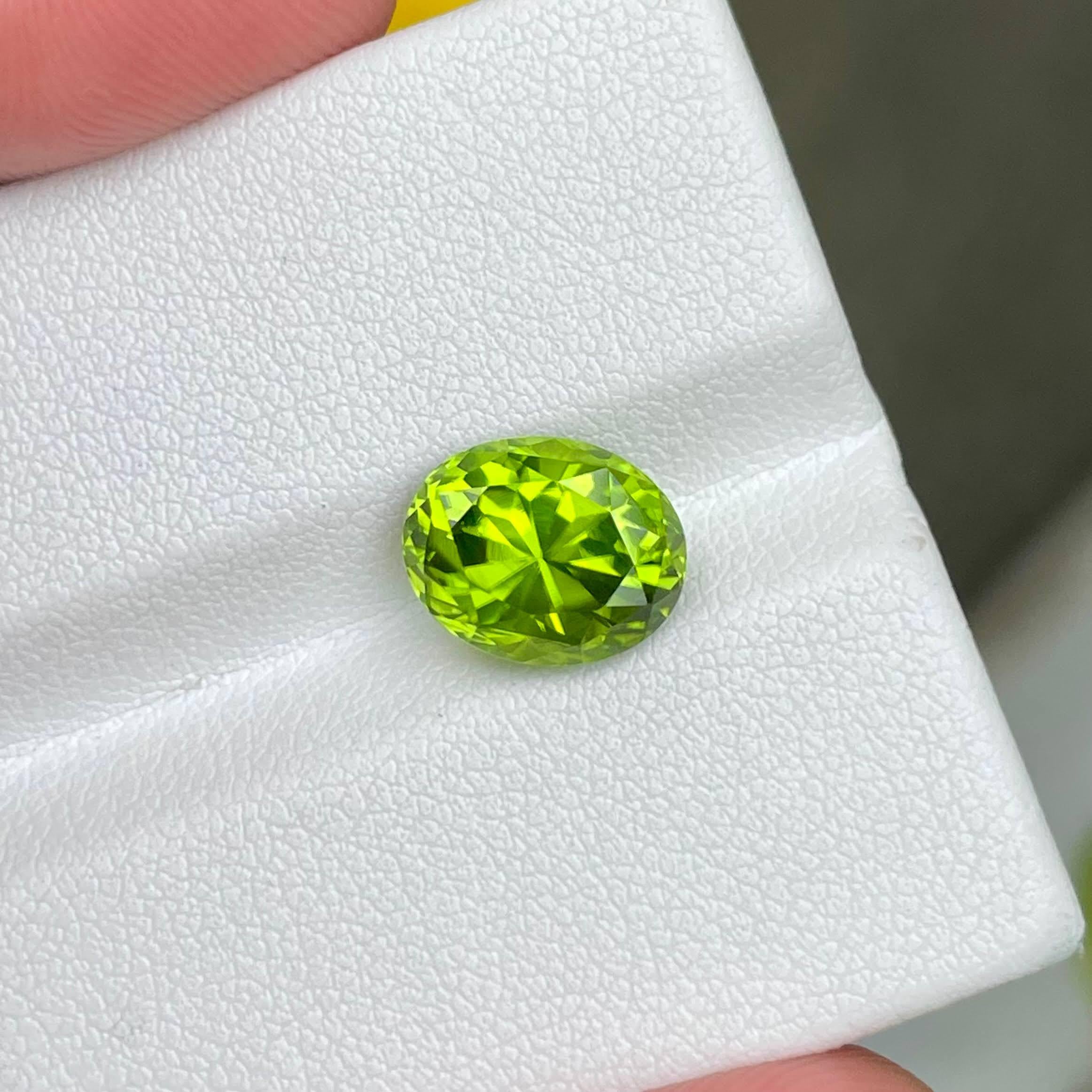 Oval Cut 4.40 carats Apple Green Peridot Stone Oval Shape Natural Pakistani Gemstone For Sale