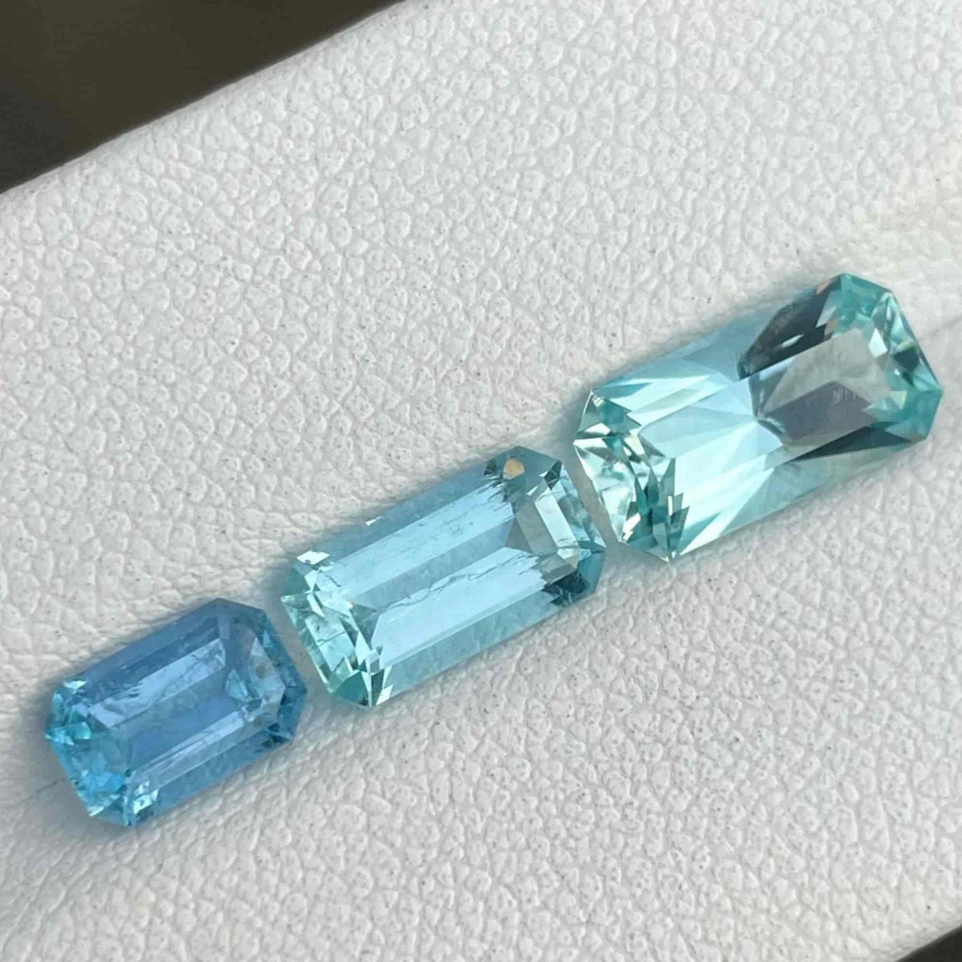 Gemstone Type Natural Dark Blue Aquamarine
Weight 4.40 carats
Individual Weight 1.95, 1.15, and 1.10 carats
Clarity Slightly Included (SI)
Origin Brazil
Treatment None





Introducing a captivating batch of Dark Blue Aquamarine stones, each