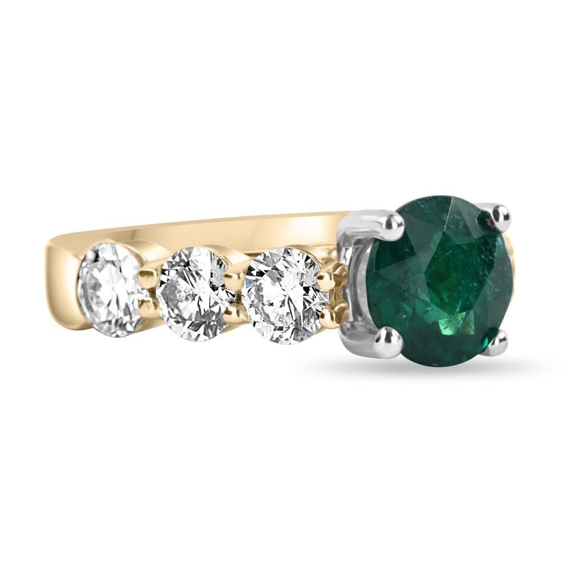 Displayed is an extraordinary 4.55-total carat weight round vivid Dark green emerald & diamond solitaire with accents engagement or statement ring in 18K yellow & white gold. This gorgeous ring carries a full 2.25-carat dark green emerald expertly