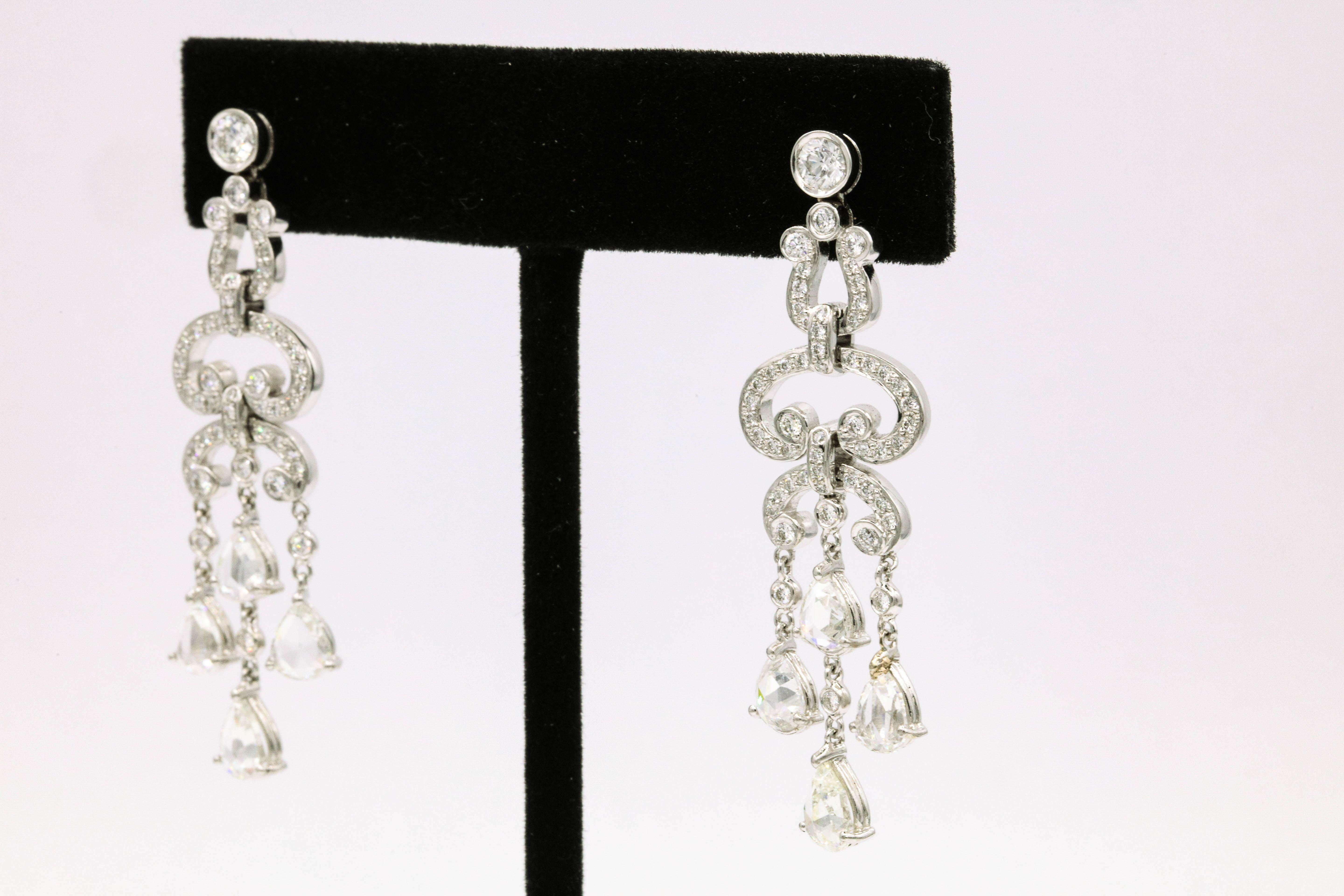 Round Cut 4.41 Carat Diamond Drop Round and Pear Shape Earrings