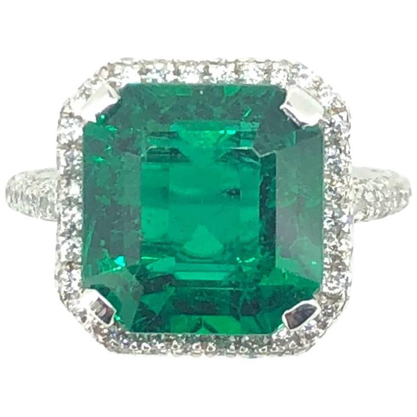 4.41 Carat Emerald Diamond Cluster Ring For Sale