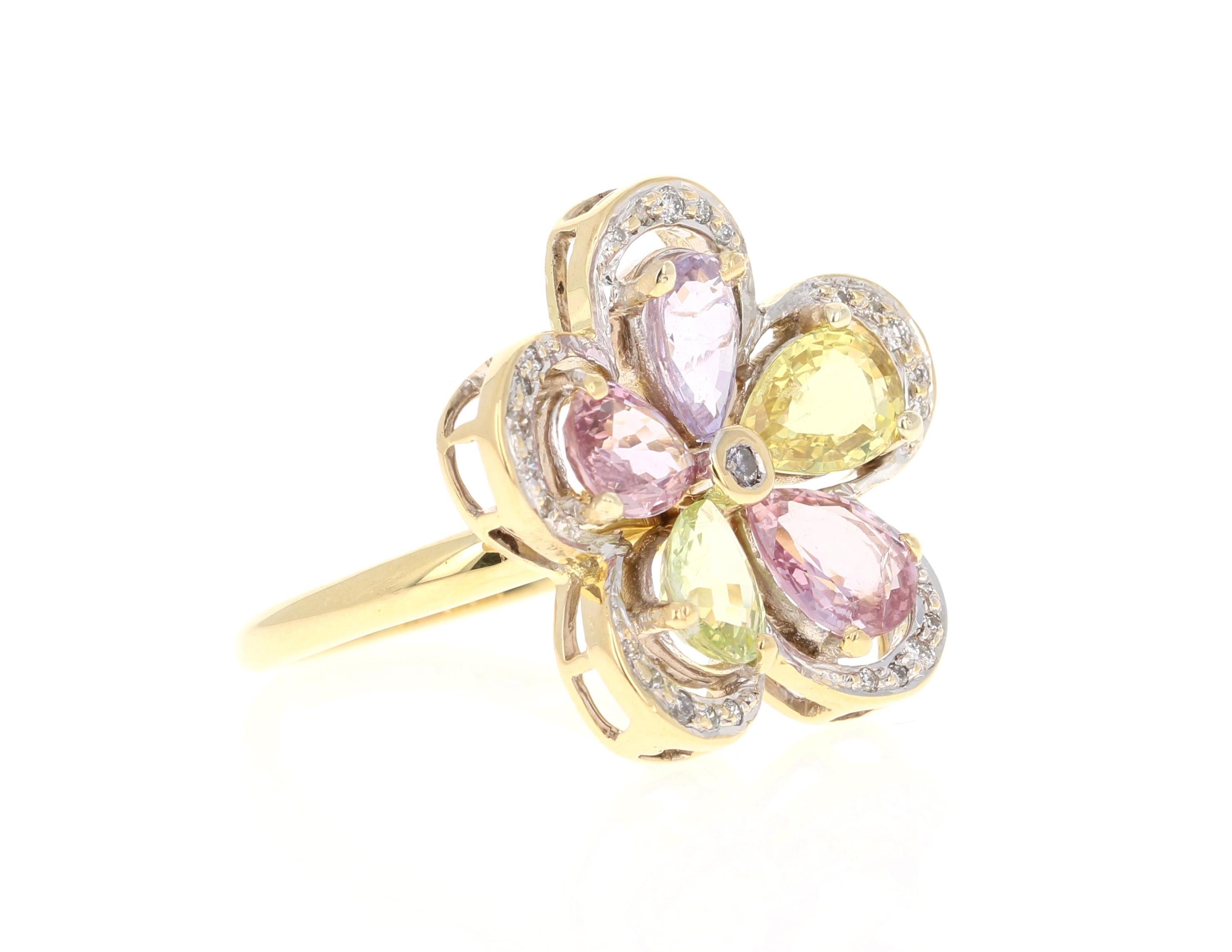 Beautiful and Unique Multi Sapphire & Diamond Flower Ring

This ring has 5 Pear Cut Multi-Colored Sapphires that weigh 4.24 Carats. It also has 25 Round Cut Diamonds that weigh 0.17 Carats. Clarity: VS and Color: H. The total carat weight of the