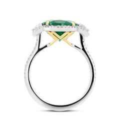 4.41 cts Certified Muzo Oval Emerald & Cadillac Diamond Three-stone Halo Ring
