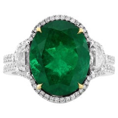 4.41 cts Certified Muzo Oval Emerald & Cadillac Diamond Three-stone Halo Ring