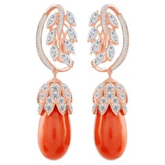 Boucles d'oreilles pendantes en forme de feuille, avec un corail de 44,16 carats et un diamant SI/H de 7,2 carats, en or rose 14 carats