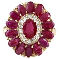 Anello con diamante e rubino naturale in oro giallo 14 carati