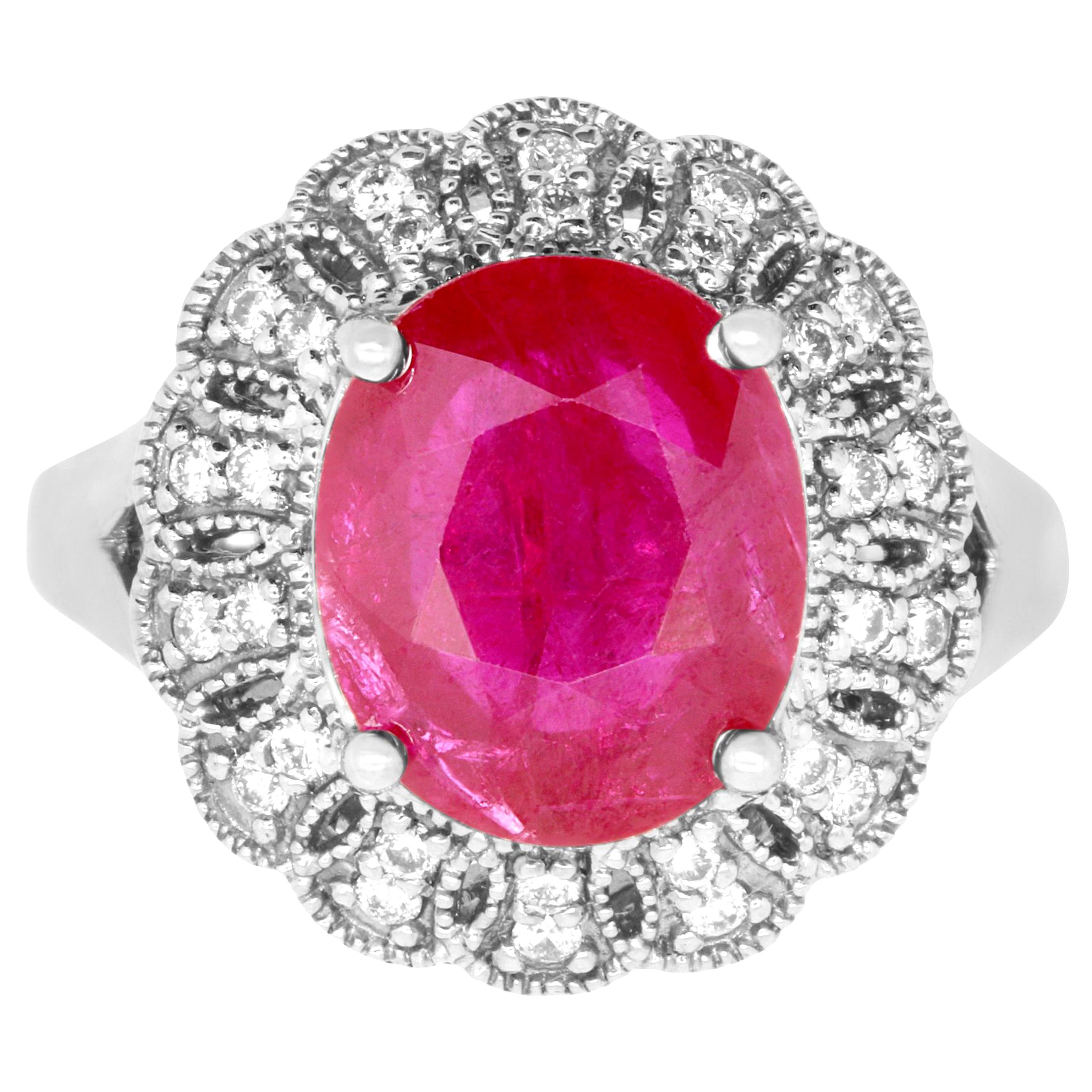 4.42 Carat Oval Ruby and 0.34 Carat White Diamond Ring