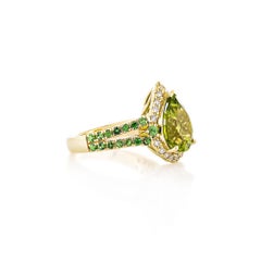 Sunita NahataPeridot 4.42ct. Fancy Ring in 18KYG with Tsavorite & Diamond.