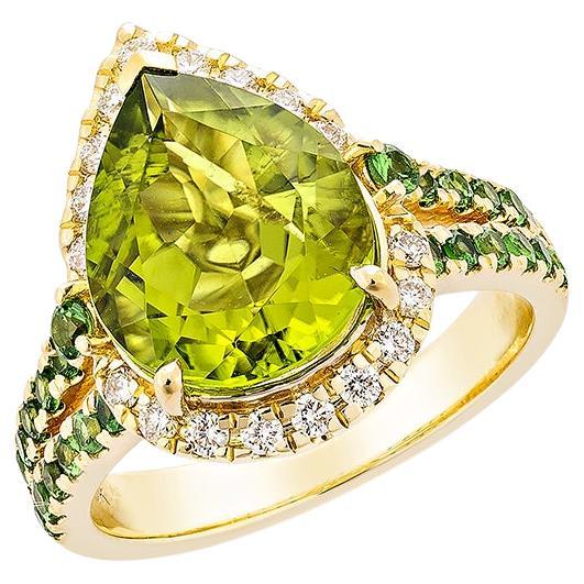 4.42 Carat Peridot Fancy Ring in 18KYG with Tsavorite and White Diamond.   For Sale