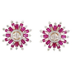 Orecchini in oro rosa con diamanti taglio brillante rotondo da 4.42 carati