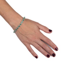 Bracelet d'émeraudes de taille ovale et de 3,30 carats de poids total et de diamants ronds