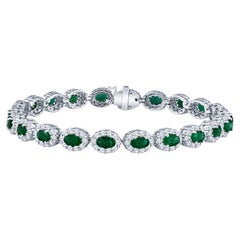 4.42 Carat Total Weight Oval Cut Emerald and 3.30ctw Round Diamond Bracelet 