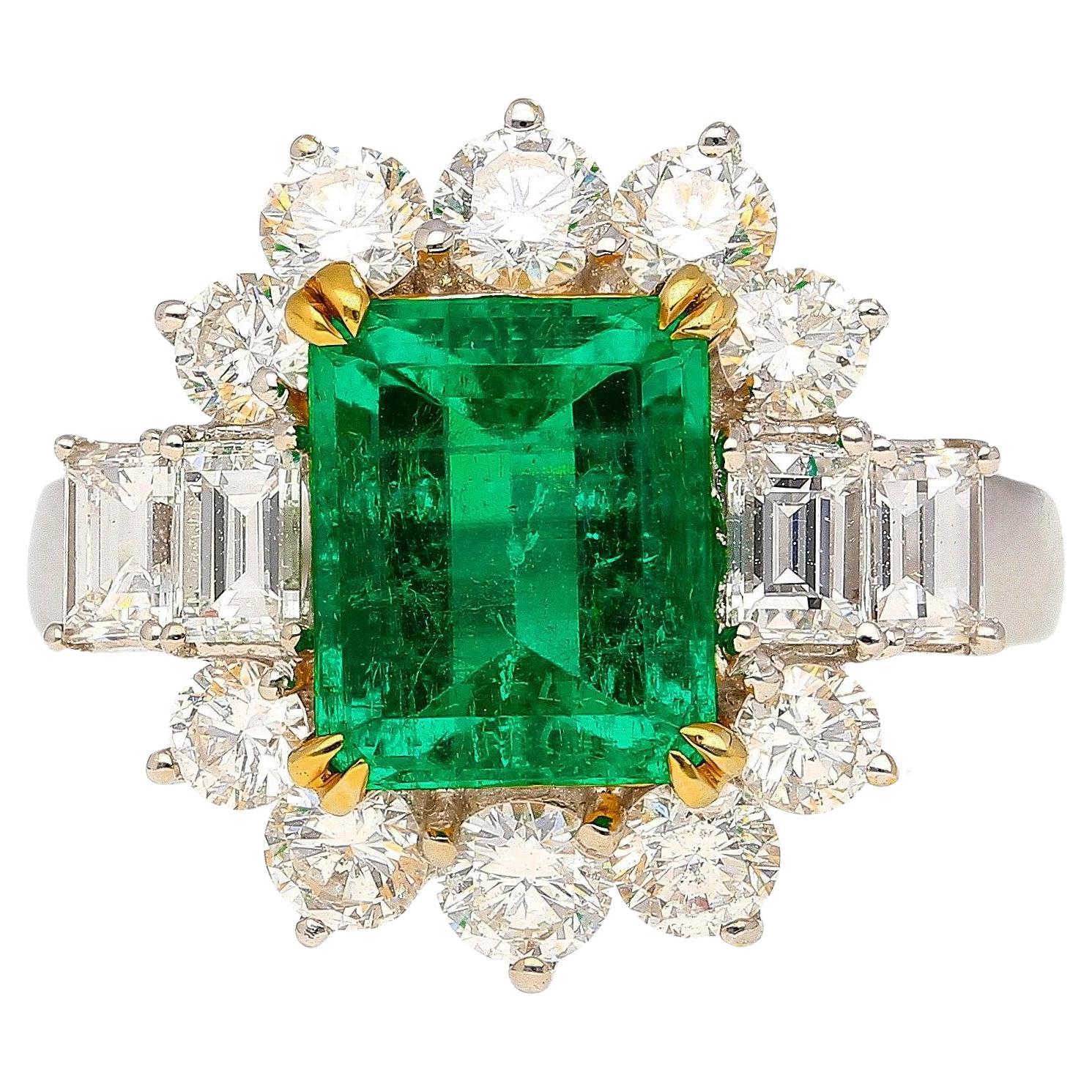 4.42 Carat TW Colombian Emerald with Round & Emerald Cut Diamond Halo 18K Ring