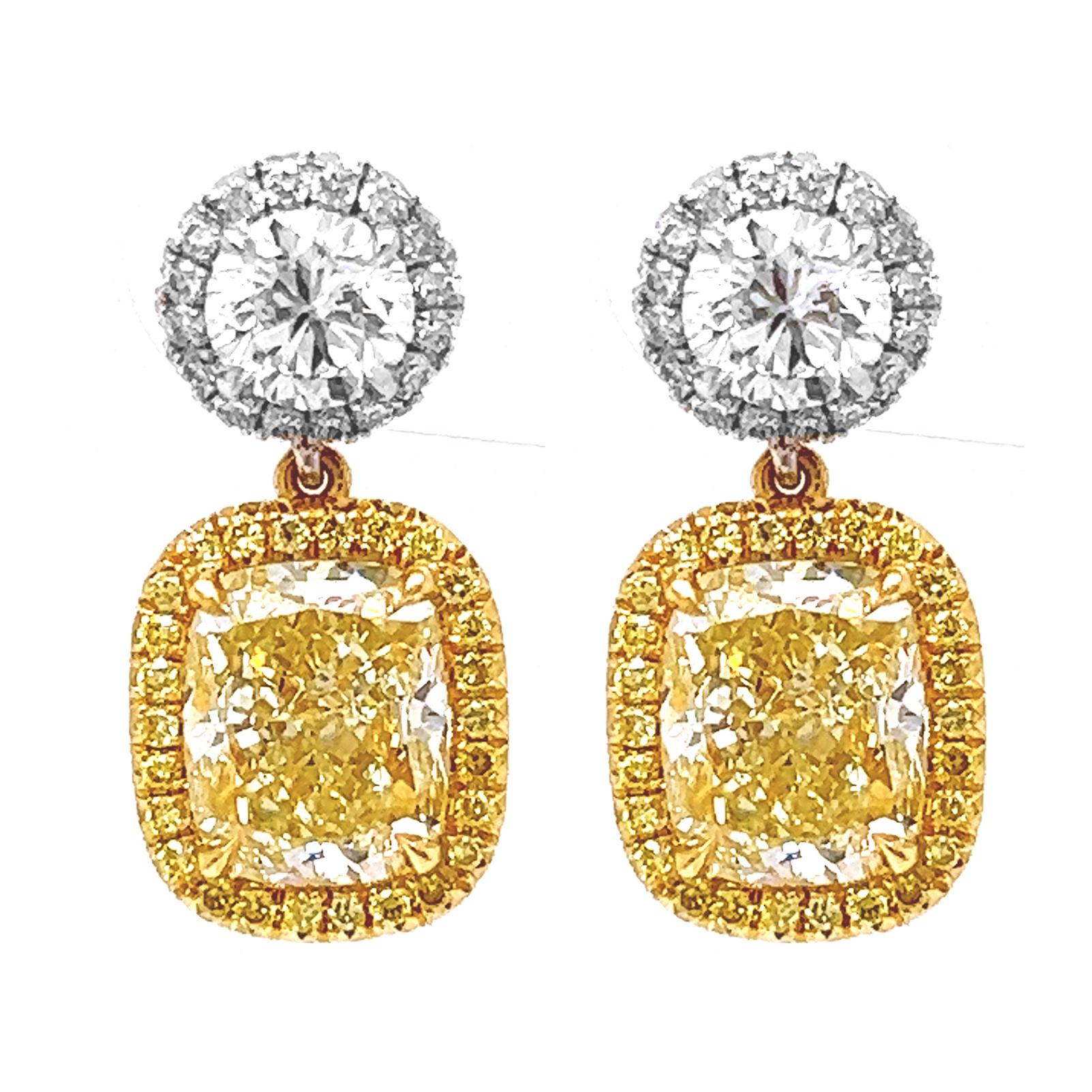 Exquisite 4.42 Carat Total Weight Natural Mined Fancy Yellow Diamond Halo Cocktail Earrings - 18KT Gold

Description:
Elevate your elegance with our Exquisite 4.42 Carat Total Weight Natural Mined Fancy Yellow Diamond Halo Cocktail Earrings,