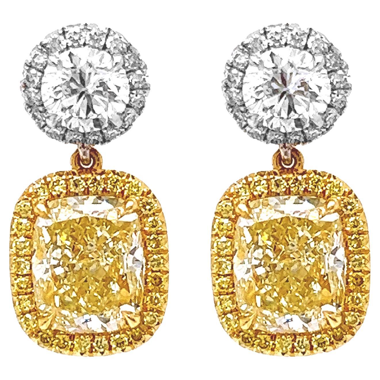 4.42 Carat T.W. Natural Mined Fancy Yellow Diamond Halo Cocktail Earrings 18KT  For Sale