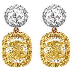 4.42 Carat T.W. Natural Mined Fancy Yellow Diamond Halo Cocktail Earrings 18KT 