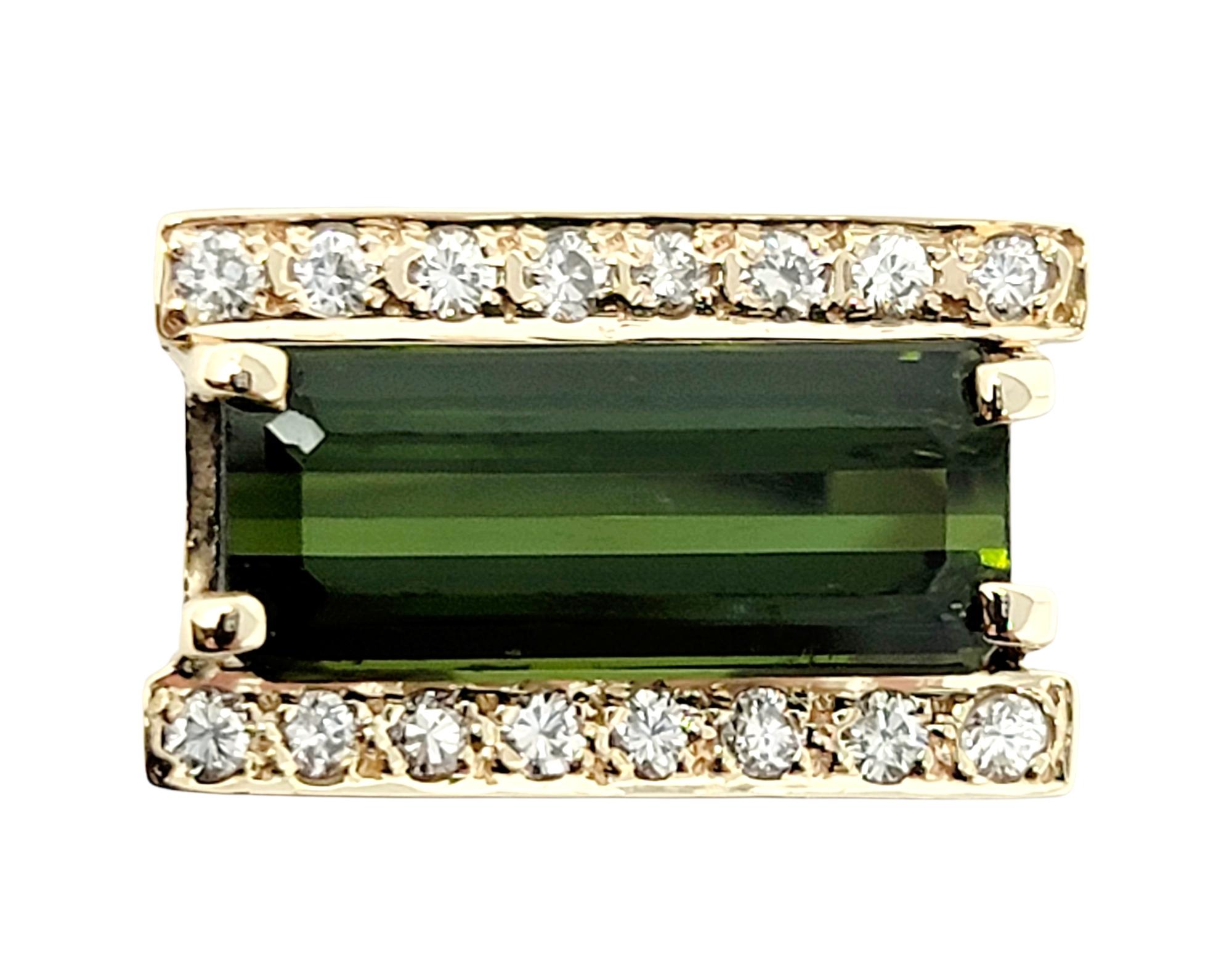 Ring size: 6.25

Gorgeous contemporary green tourmaline and pave diamond ring. The rectangular step cut green tourmaline stone sits at the very center of the piece in a horizontal layout and is surrounded on either side by glittering natural
