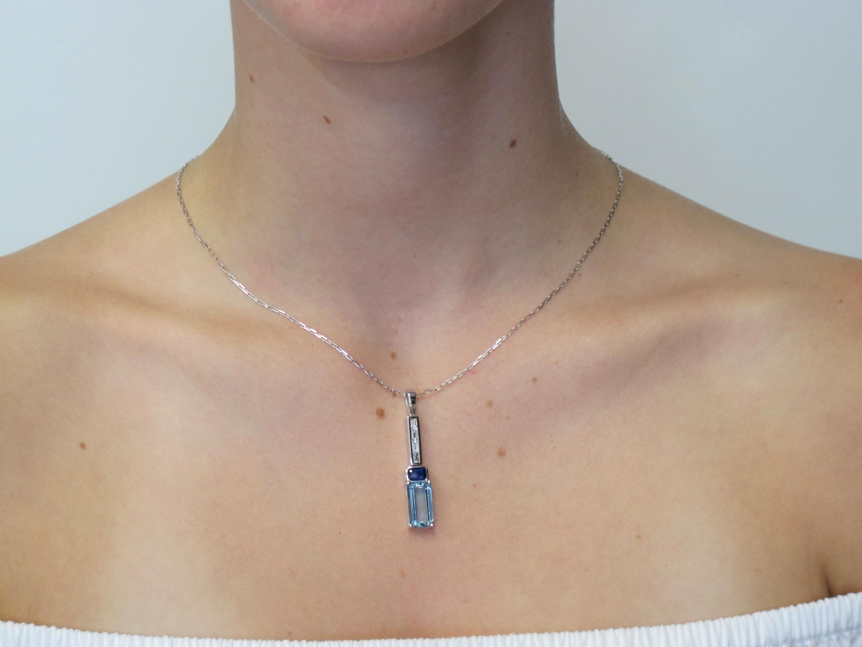 This clean, classic pendant has a soft delicate grace to it. Its simple lines and multiple gemstones, give this necklace some subtle spunk! The depth of the color in this stunning aquamarine gemstone is incredibly rare. Our take on Art Deco; 