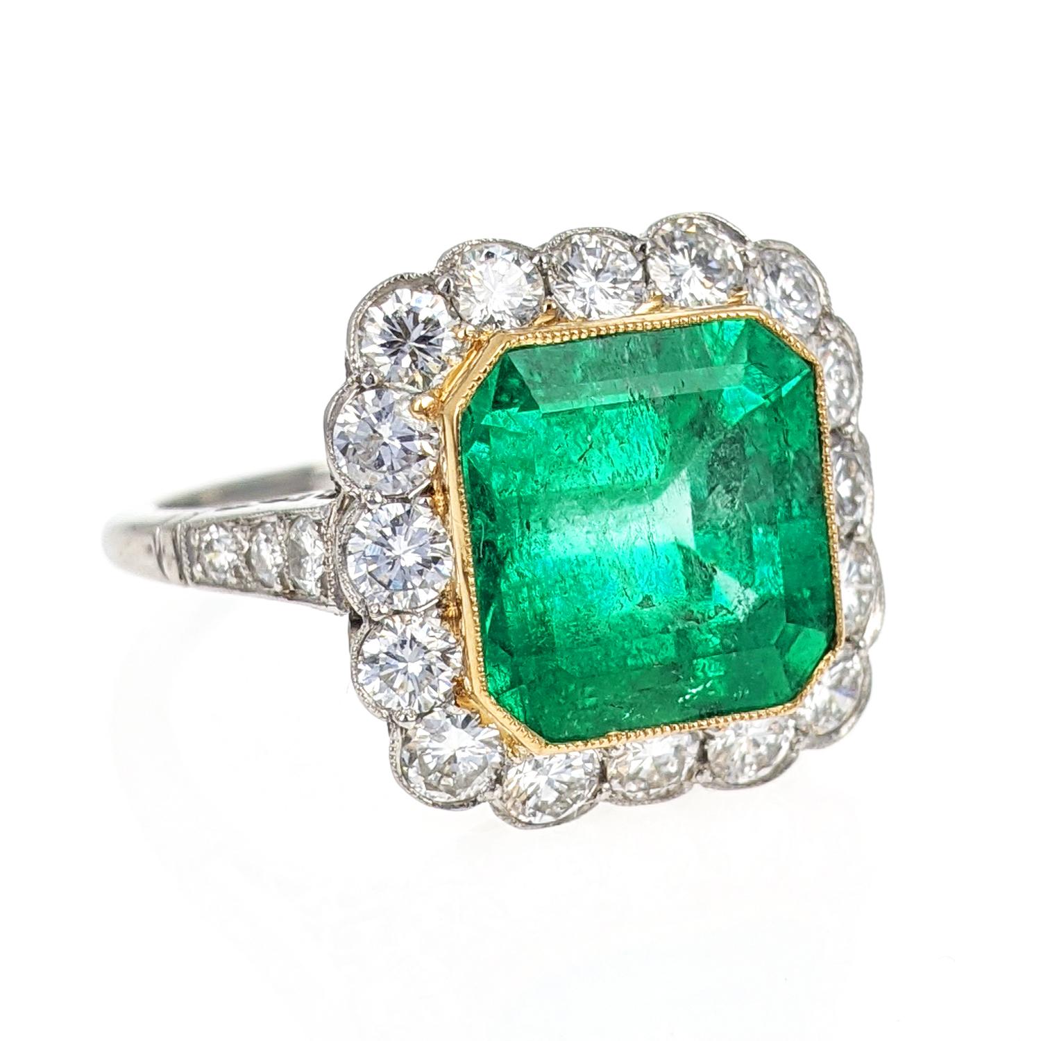 Emerald Cut 4.43 Carat Colombian Emerald Diamond Halo Platinum Ring