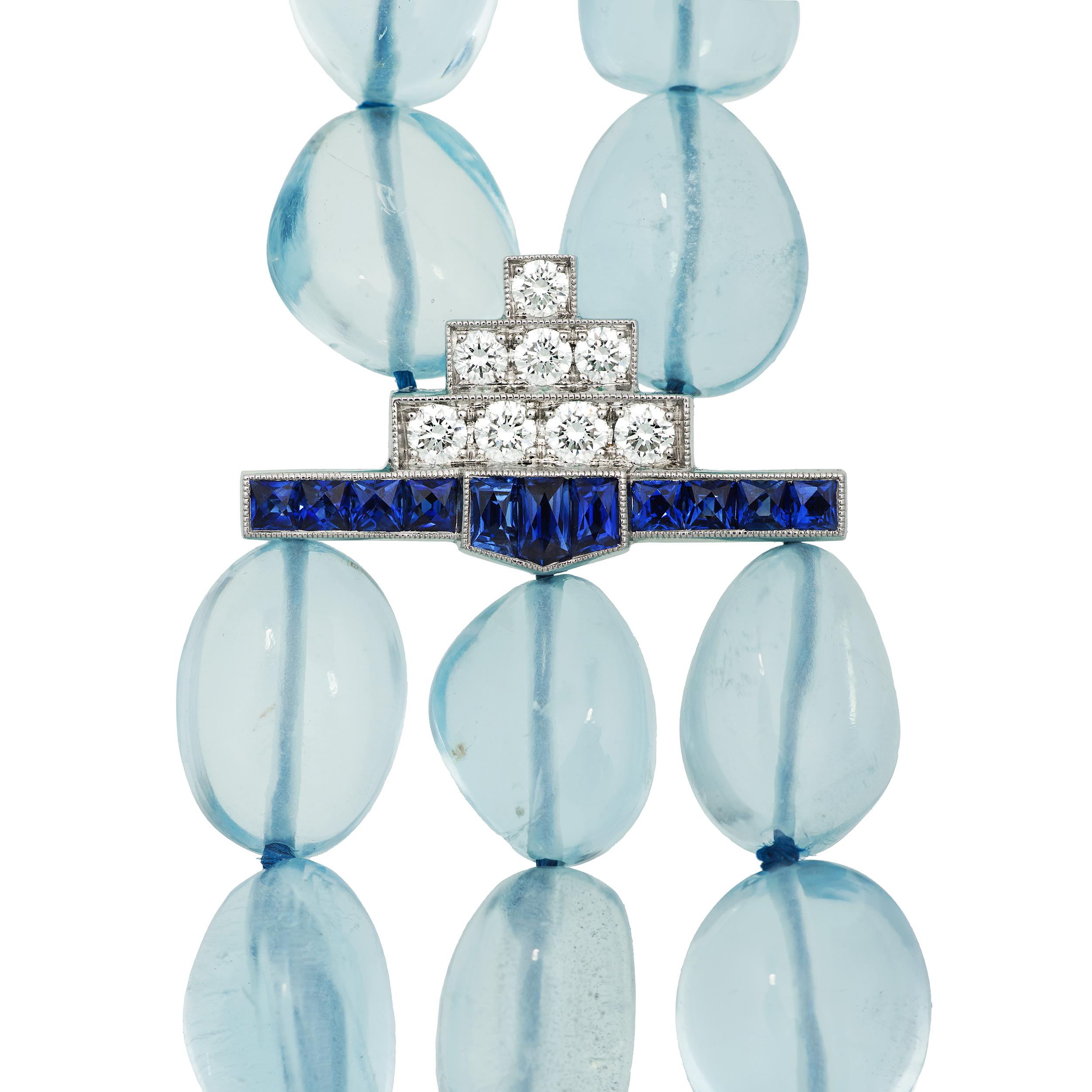 Inspiration for this incredible one of a kind Multi-strand necklace came from a vintage ring that can be called nothing short of a bauble.  Drawing from the inspiration came luxurious but organic Aquamarine.  They had to hold substance yet maintain