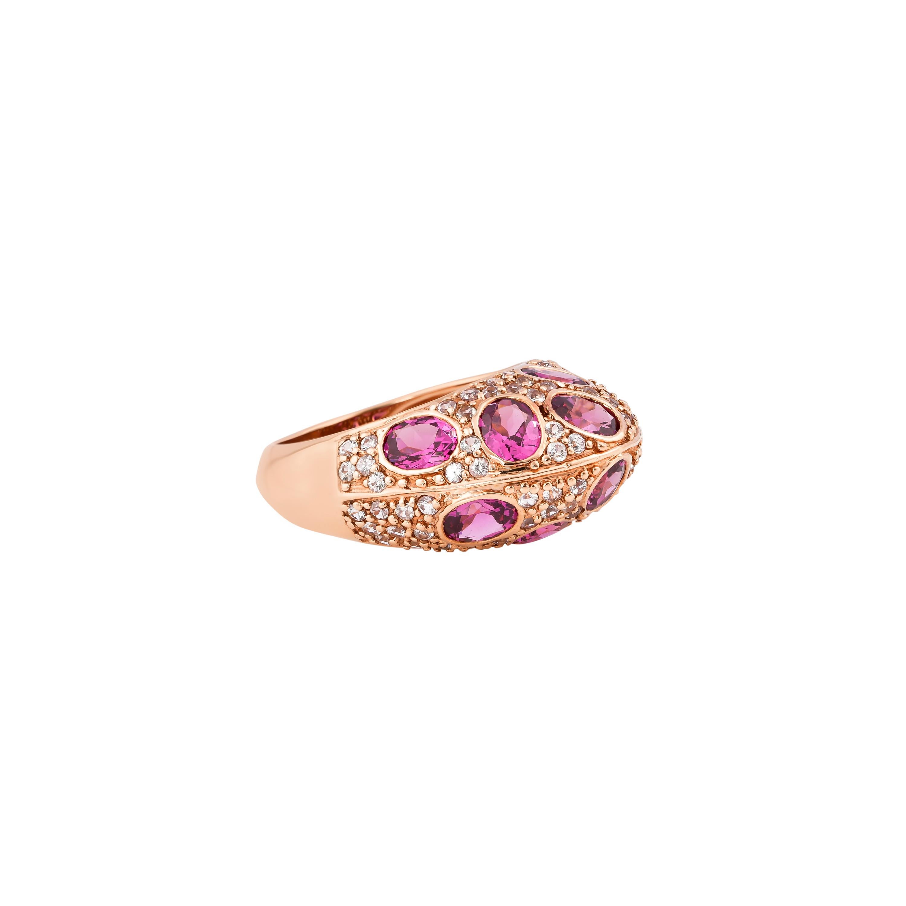Glamorous Gemstones - Sunita Nahata started off her career as a gemstone trader, and this particular collection reflects her love for multi-colored semi-precious gemstones. This ring presents a cluster of rhodolites accented with pave white