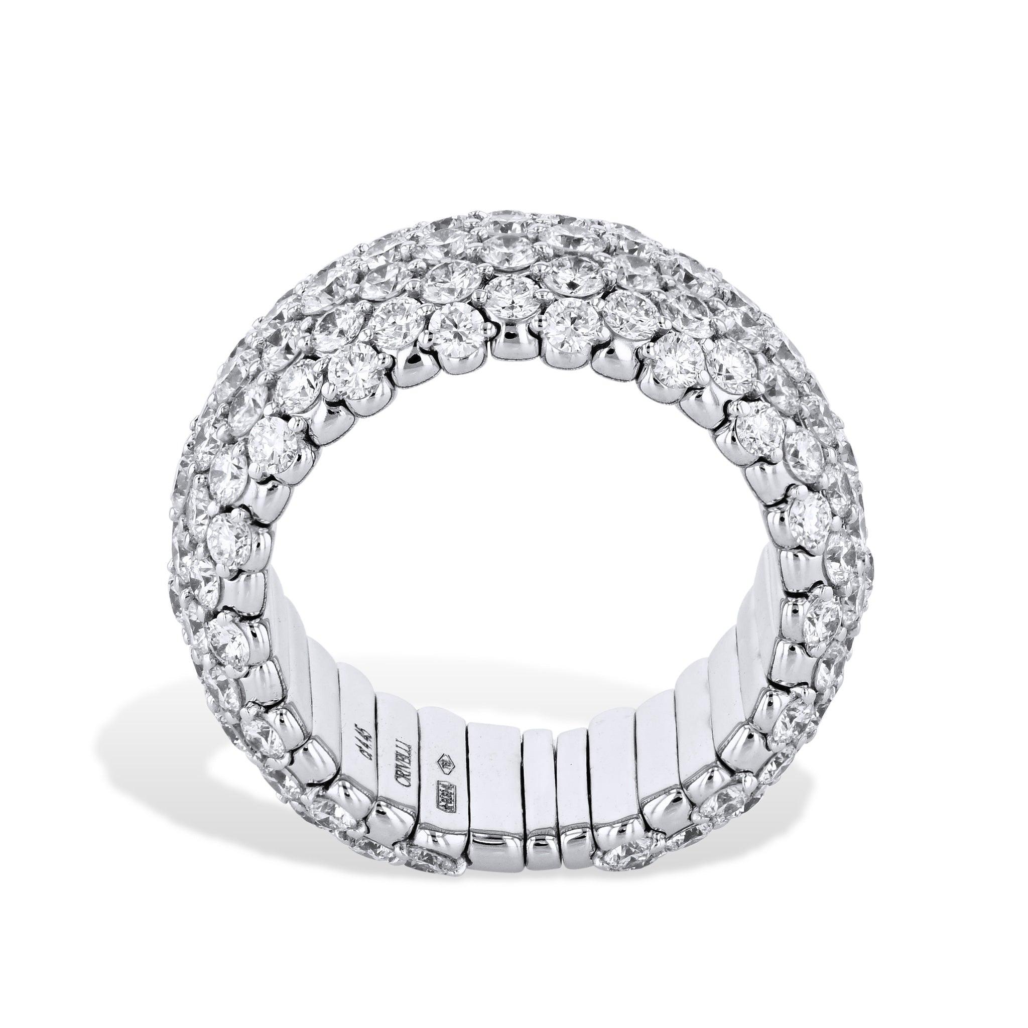 This delightful 18kt white gold stretch ring features 4.45cts of sparkling round diamonds, in a tasteful and classic look. The expanding stretching action makes this ring easy and comfortable to slip on and off, while its outstanding manufacturing