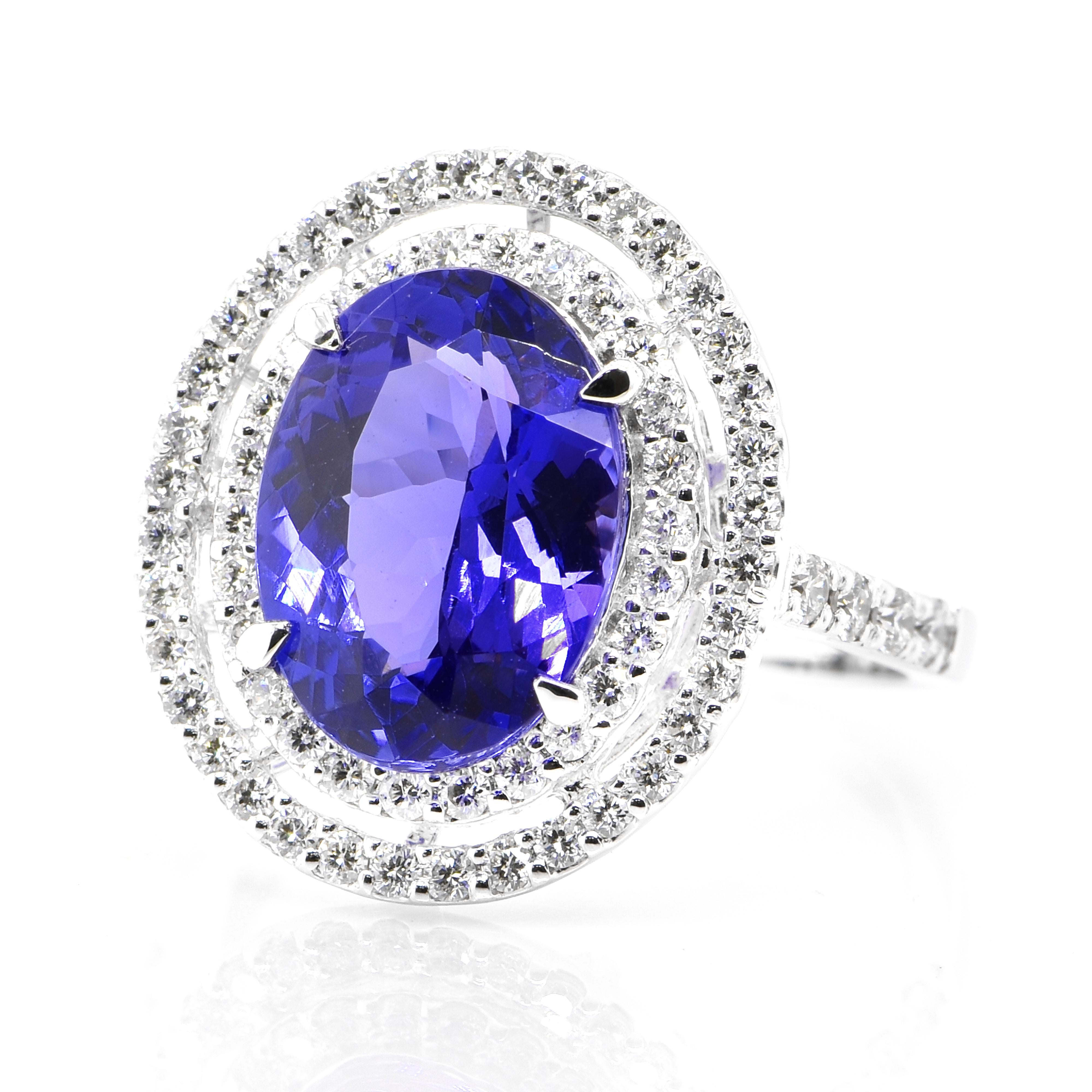 A beautiful ring featuring a 4.45 Carat Natural Tanzanite and 0.72 Carats Diamond Accents set in Platinum. Tanzanite's name was given by Tiffany and Co after its only known source: Tanzania. Tanzanite displays beautiful pleochroic colors meaning