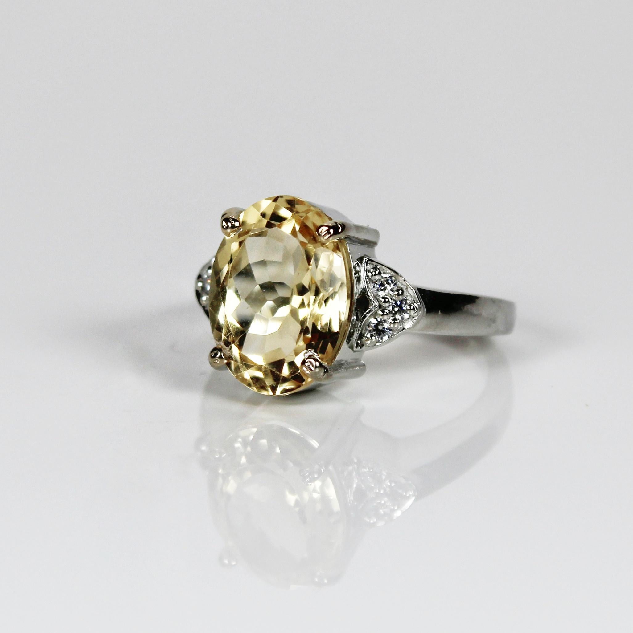 Metal - Silver
Indian ring size - 11
Product gross Weight - 4.990 Grams
Gemstone - Natural Citrine
Stone weight - 4.45 Carat
Stone shape - Oval
Stone size - 13 x 9 mm
Diamonds - Swarovski

Elegant designer ring made in silver with beautiful natural
