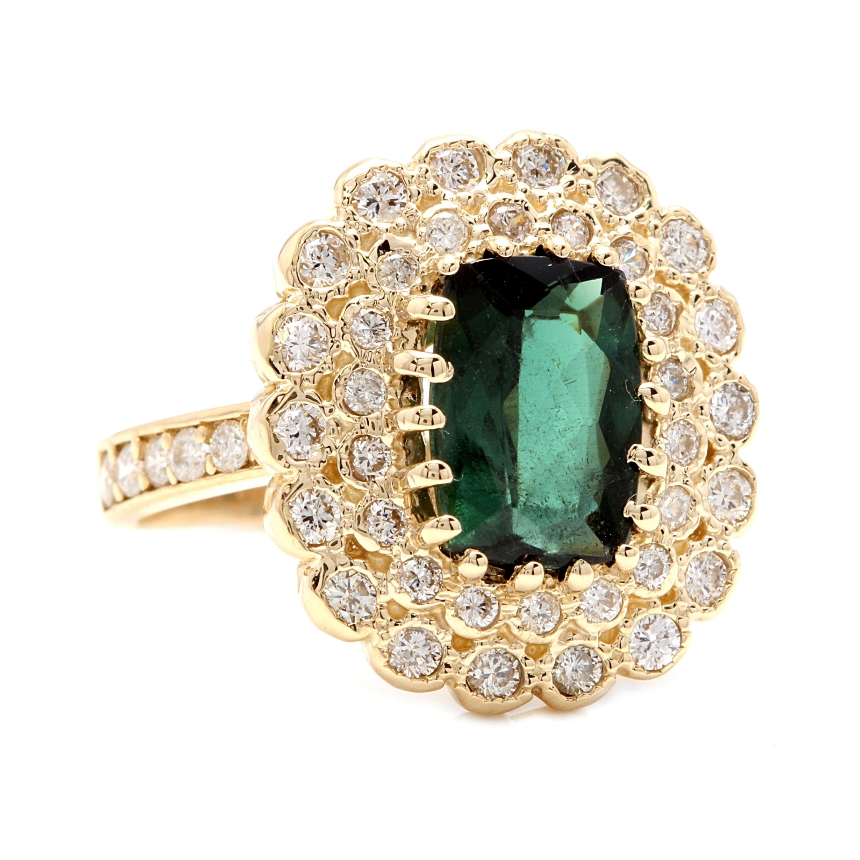 4.45 Carats Natural Very Nice Looking Green Tourmaline and Diamond 18K Solid Yellow Gold Ring

Total Natural  Cushion Tourmaline Weight is: Approx. 3.50 Carats (Treatment-Heat)

Tourmaline Measures: Approx. 10.00 x 8.00mm

Natural Round Diamonds