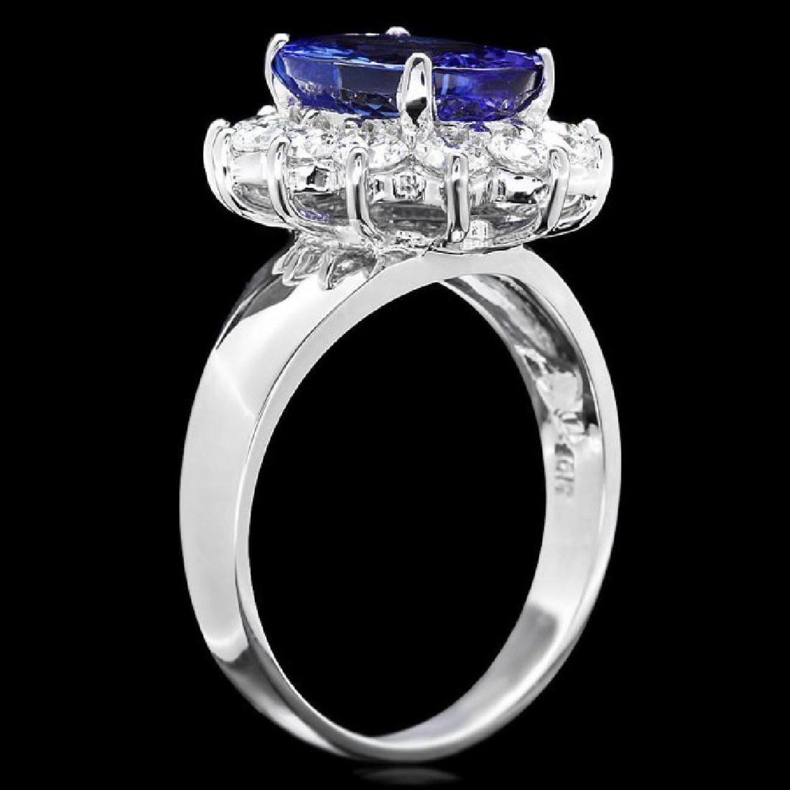 4.45 Carats Natural Very Nice Looking Tanzanite and Diamond 14K Solid White Gold Ring

Total Natural Oval Cut Tanzanite Weight is: Approx. 3.50 Carats

Tanzanite Measures: Approx. 11.00 x 9.00mm

Natural Round Diamonds Weight: Approx. 0.95 Carats