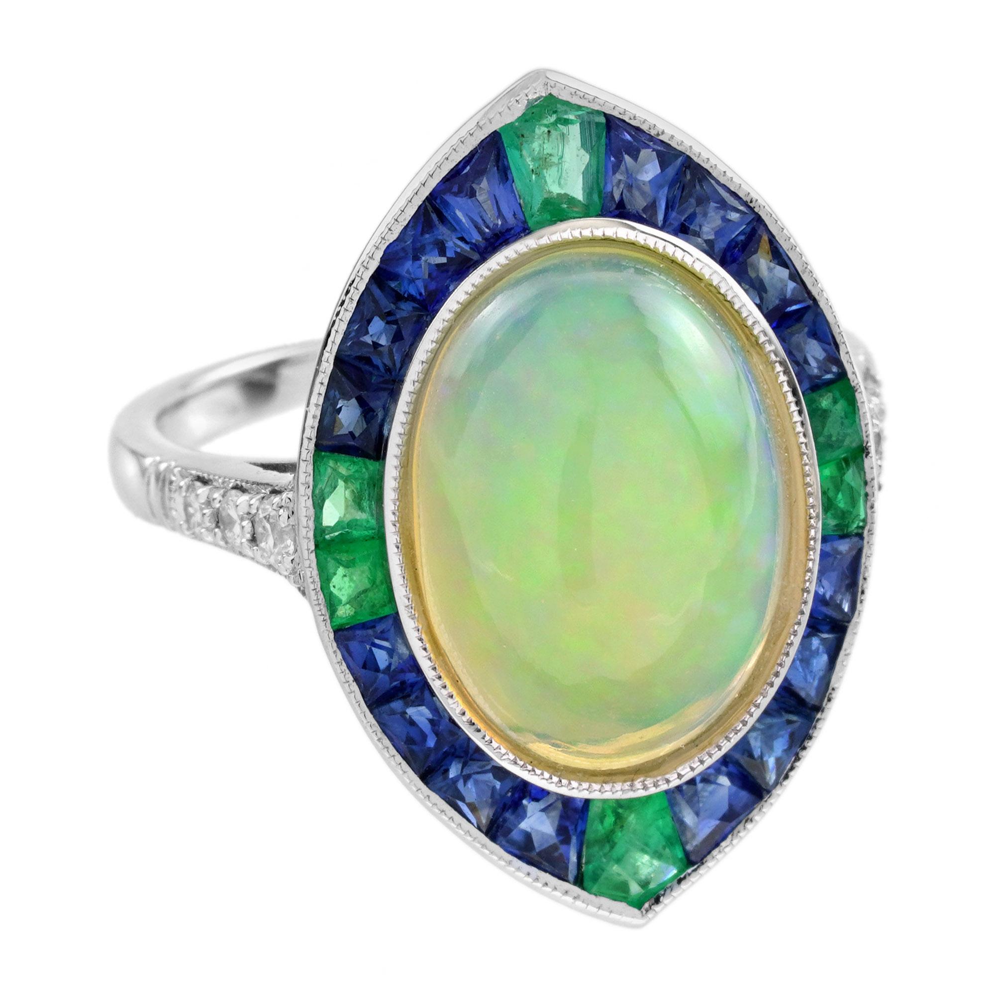 A mesmerizing Ethiopian opal at its center, glowing with vibrant colors. Framed by deep sapphires, the opal's beauty is further enhanced by emerald accents on the top, left, and right and bottom. A stunning combination of color and texture, perfect