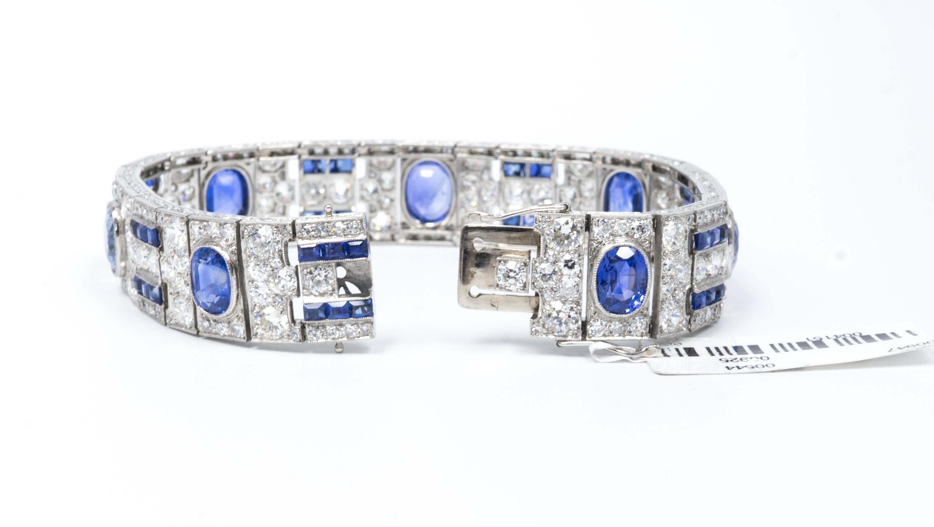 A Sapphire and diamond Art Deco Style Platinum Bracelet with approximately 18.50 carats of diamonds ( 238 diamonds) and 7 sapphires weighing approximately 20.0 carats total with an additional 42 sapphires weighing approximately 6.00 carats, set in