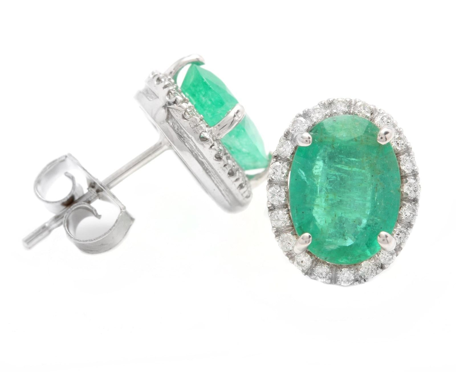 4.45 Carats Natural Emerald and Diamond 14K Solid White Gold Earrings

Amazing looking piece! 

Suggested Replacement Value Approx. $5,500.00

Total Natural Round Cut White Diamonds Weight: Approx.  0.45 Carats (color G-H / Clarity SI1-SI2)

Total