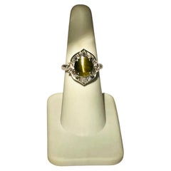 4.46 Carat Cat's Eye and White Diamond Ring in Platinum