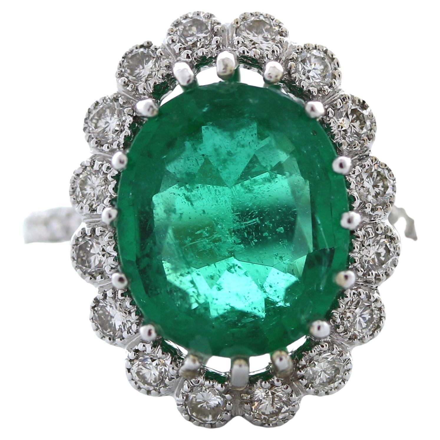 4.46 Carat Green Emerald Oval Shape & Diamond Ring in 14k White Gold For Sale