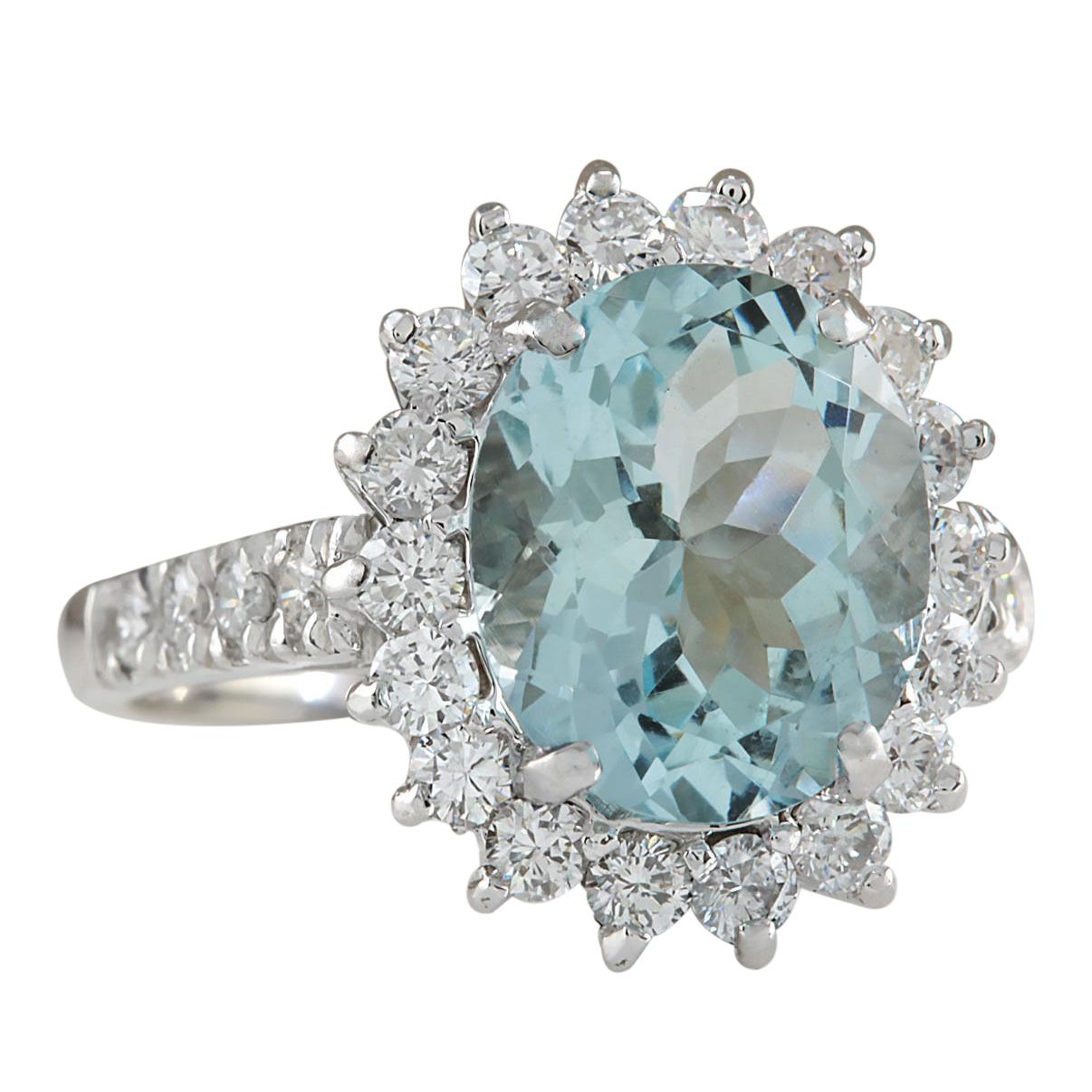 Stamped: 14K White Gold
Total Ring Weight: 5.0 Grams
Total Natural Aquamarine Weight is 3.21 Carat (Measures: 11.00x9.00 mm)
Color: Blue
Total Natural Diamond Weight is 1.25 Carat
Color: F-G, Clarity: VS2-SI1
Face Measures: 16.00x14.00 mm
Sku: